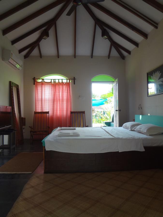 Aquatica Resorts & Spa Morjim Habitación foto